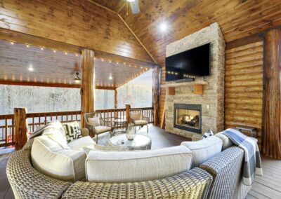 Cozy up in the outdoor lounge in front of the gas fireplace!