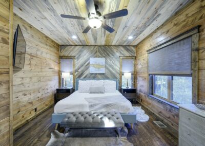 Staying in this king suite is like sleeping in a comfy treehouse.